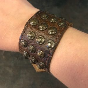 Brown leather cuff with gold studs